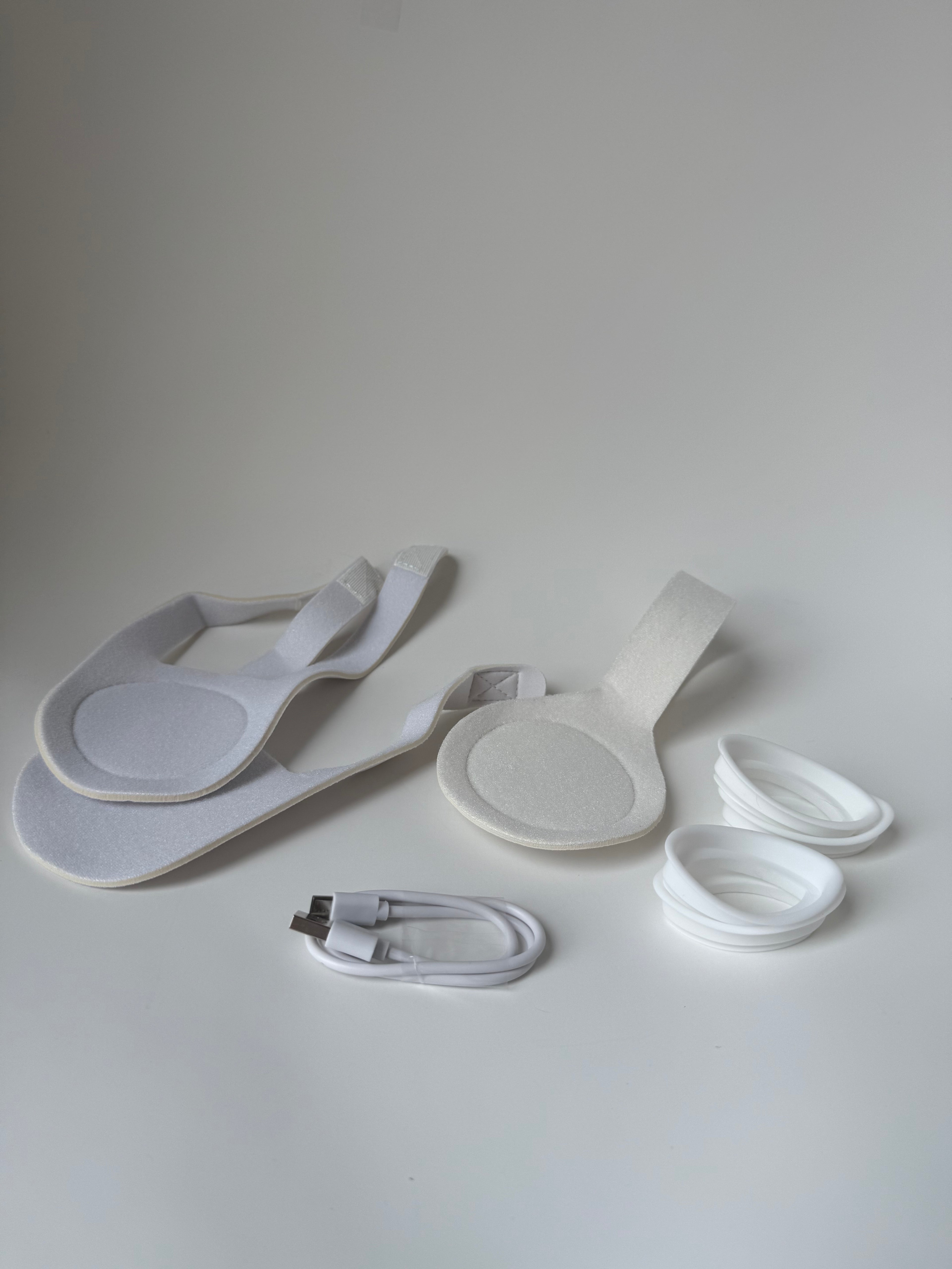 Adjustable soft straps, silicone eye protectors, and USB cable for red light therapy face mask