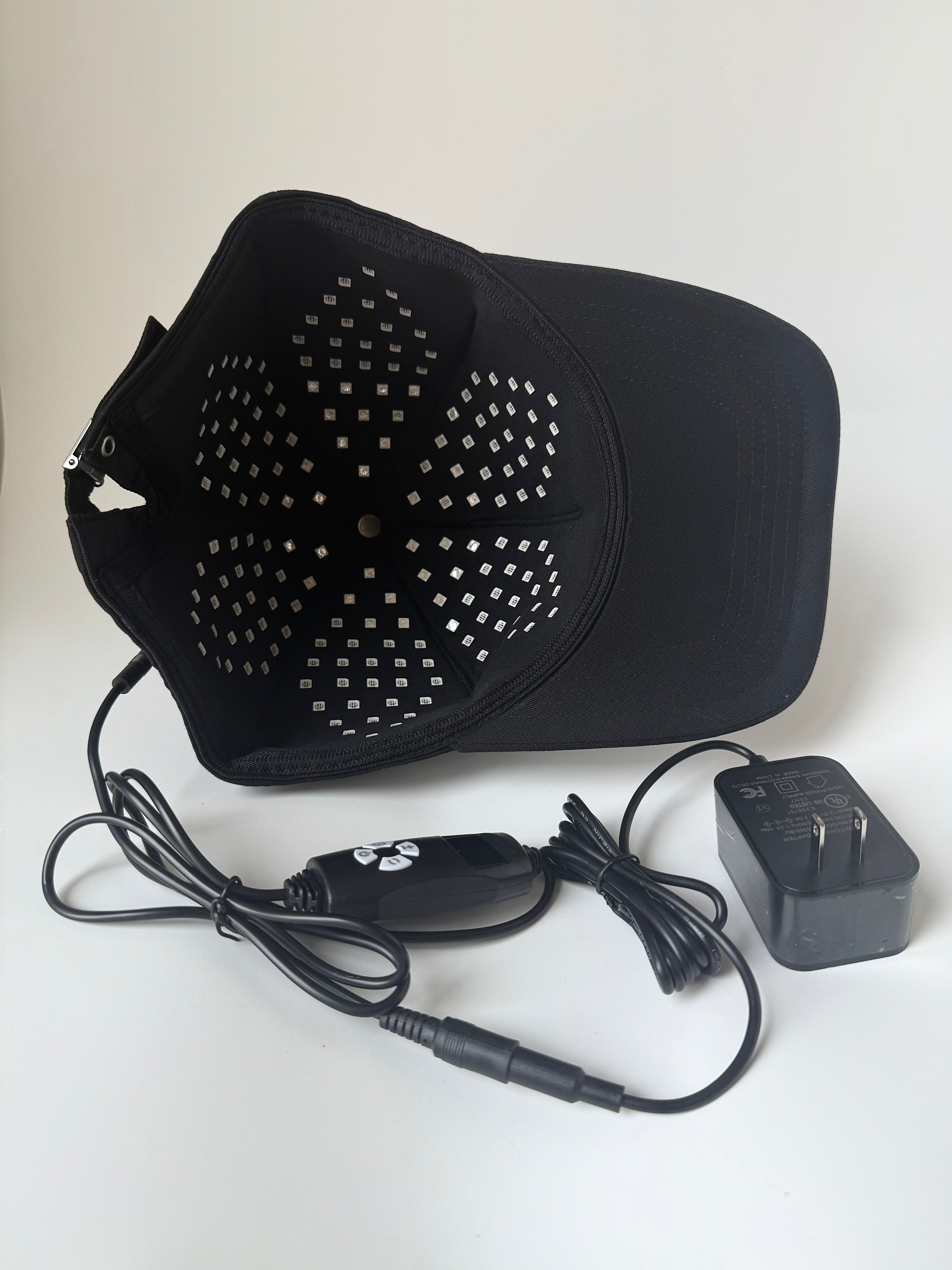 Red Glo Labs hair cap with multi-wavelength LED light therapy components